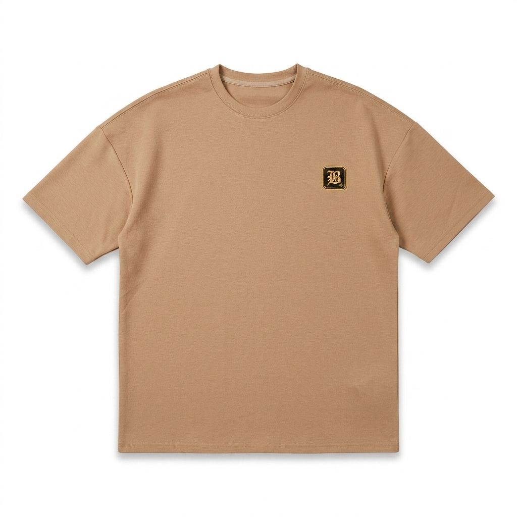 Beige t-shirt with a small logo on the chest against a white background