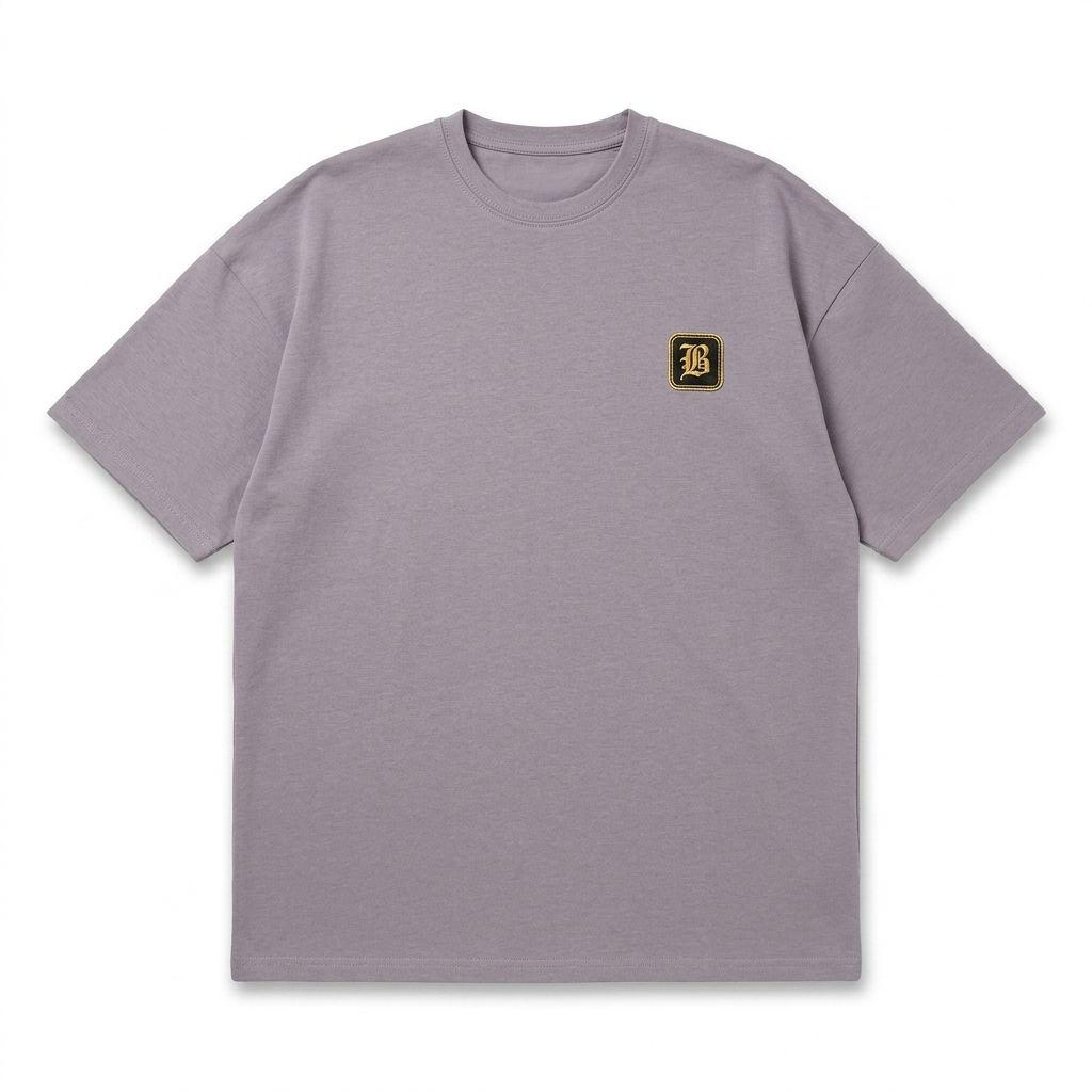 Gray t-shirt with a small logo on the chest against a white background